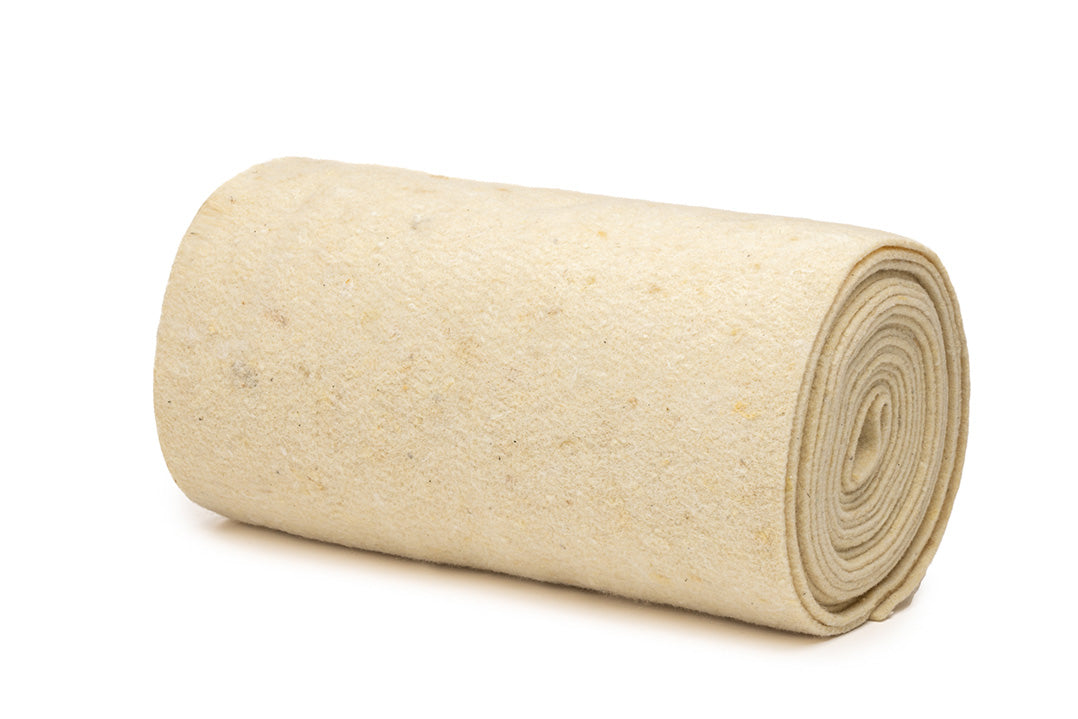 Small wool mulch mat roll protecting plants from weeds and retaining moisture