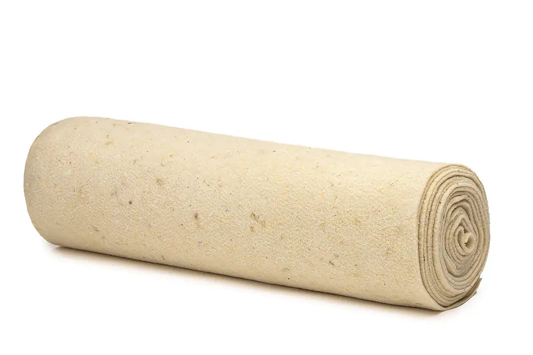 Small wool mulch mat roll protecting plants from weeds and retaining moisture